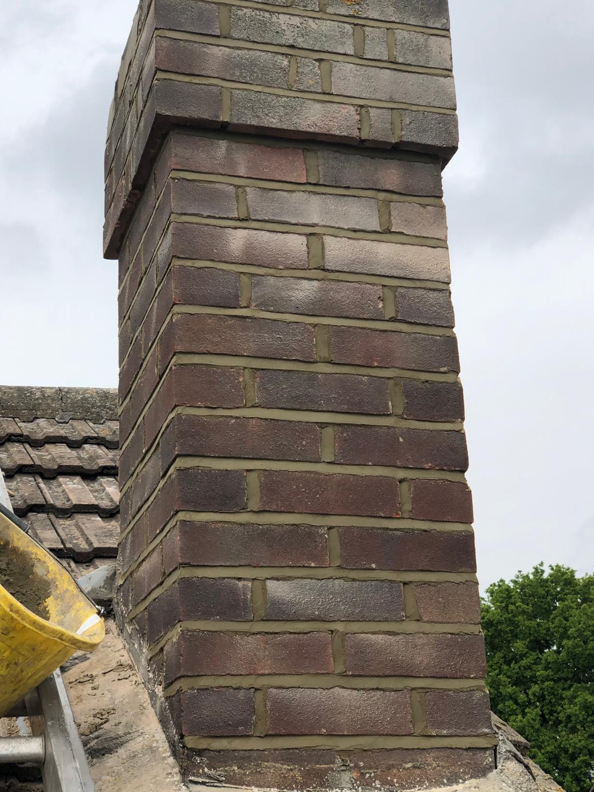 Raked out and repointed chimney stack